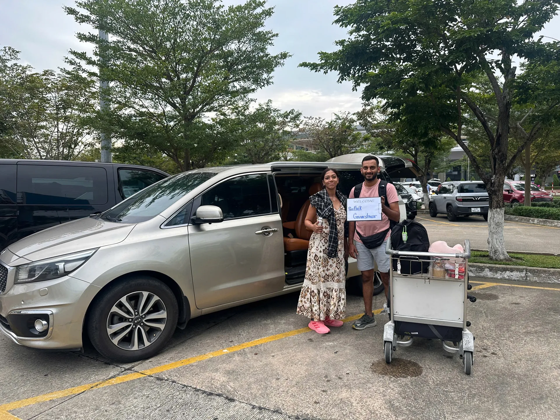 Guests with KIA Sedona minivan at Da Nang Airport